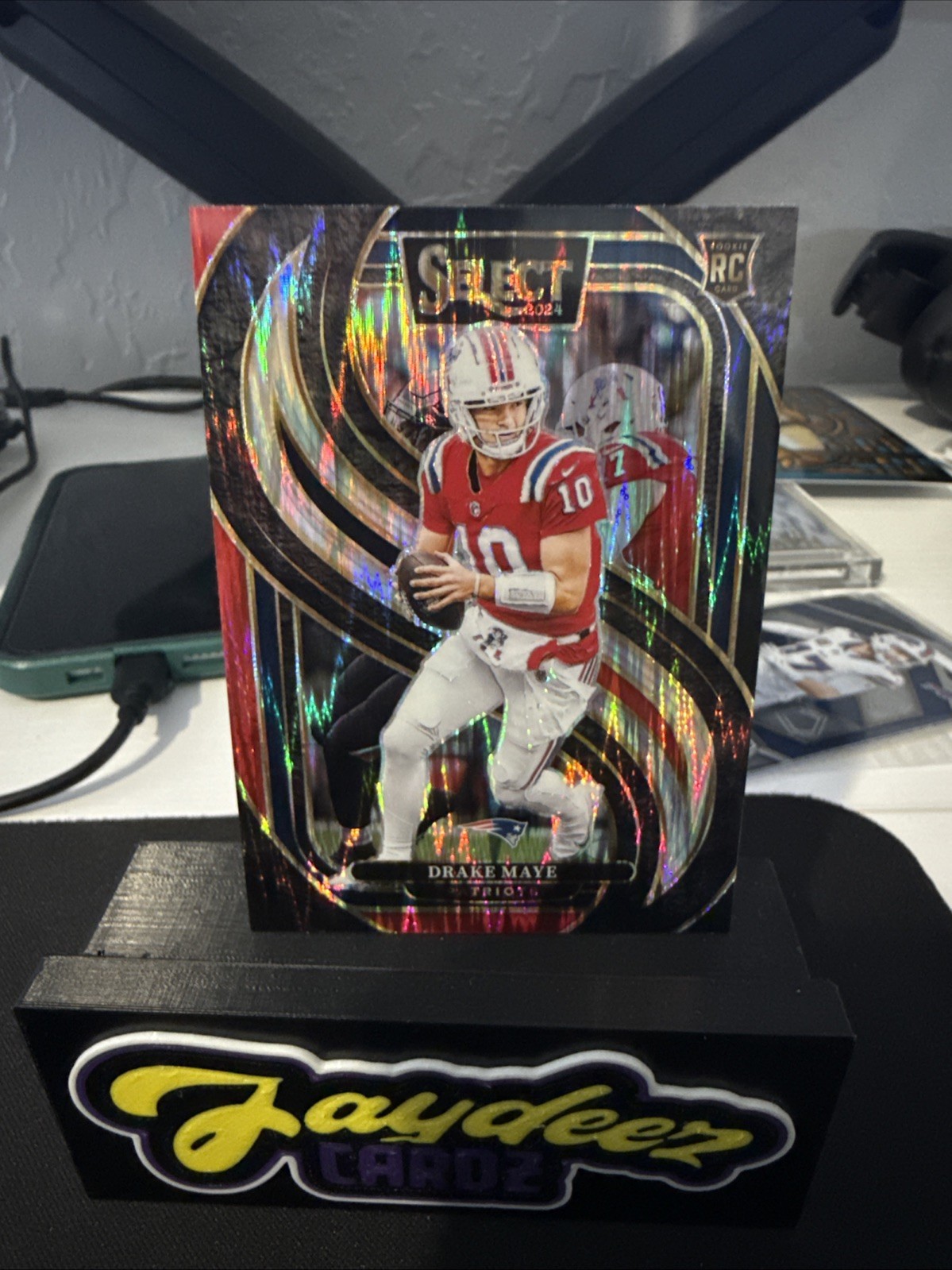 2024 Panini Select - Premier Level Drake Maye #113 Black & Red Shock Prizm (RC)