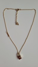 Collana Guess tono oro lucchetto chiave