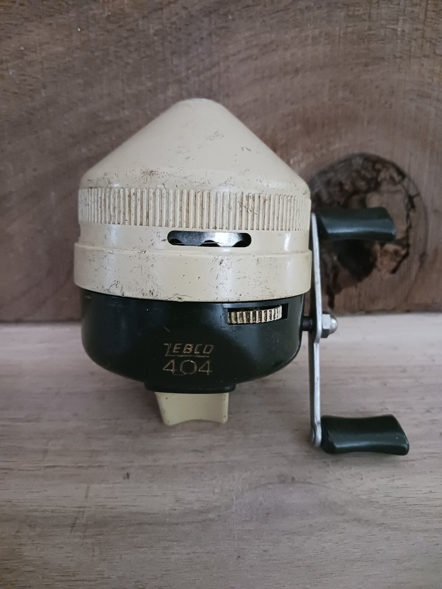 らっこ Vintage Black/Cream ZEBCO 404 Metal Foot Spincast Fishing Reel USA