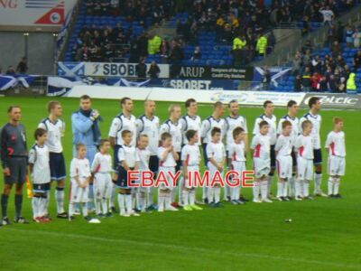 PHOTO  SCOTTISH FOOTBALL TEAM LINING UP FOR THEIR NATIONAL ANTHEM AT THE NEW CAR