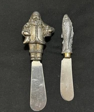 2 Vtg Santa Claus & Fish Cheese Butter Spreaders Knife Nordic Christmas Inspired