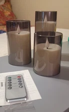 3 LED CANDLES WITH 10-KEY REMOTE N TIMER! EA TAKES 2 AA BATTERIES! NEVER USED!
