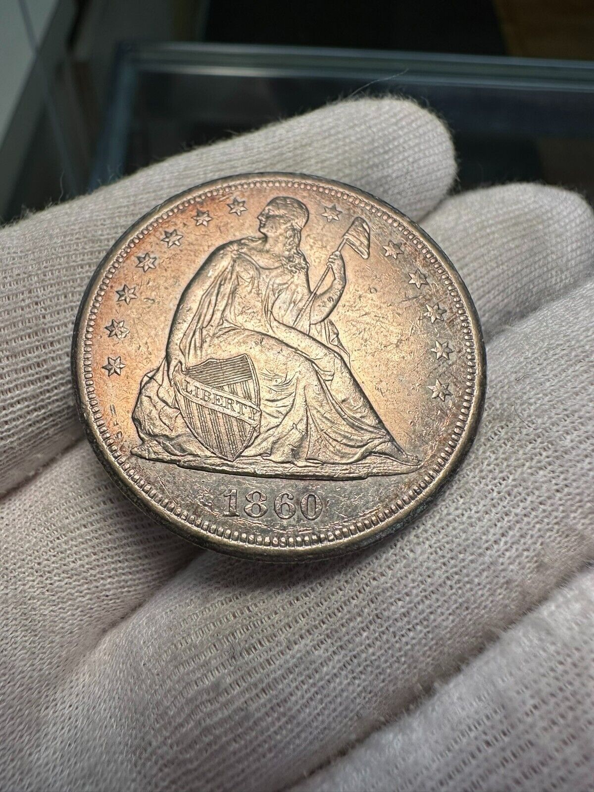 1860-O Seated Liberty Dollar AU