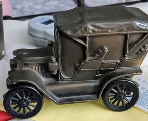1910 STANLEY STEAMER COIN BANK With A Name   On It;The Merchants National Bank, 