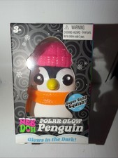 Nee Doh Squishmas Polar Glow Penguin Glow-in-the-Dark Squeeze Toy Pink hat Orig
