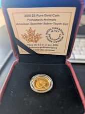 2015$5 PREHISTORIC ANIMALS Scimitar Sabre-Tooth Cat 1/10 Oz.9999 Pure Gold Coin