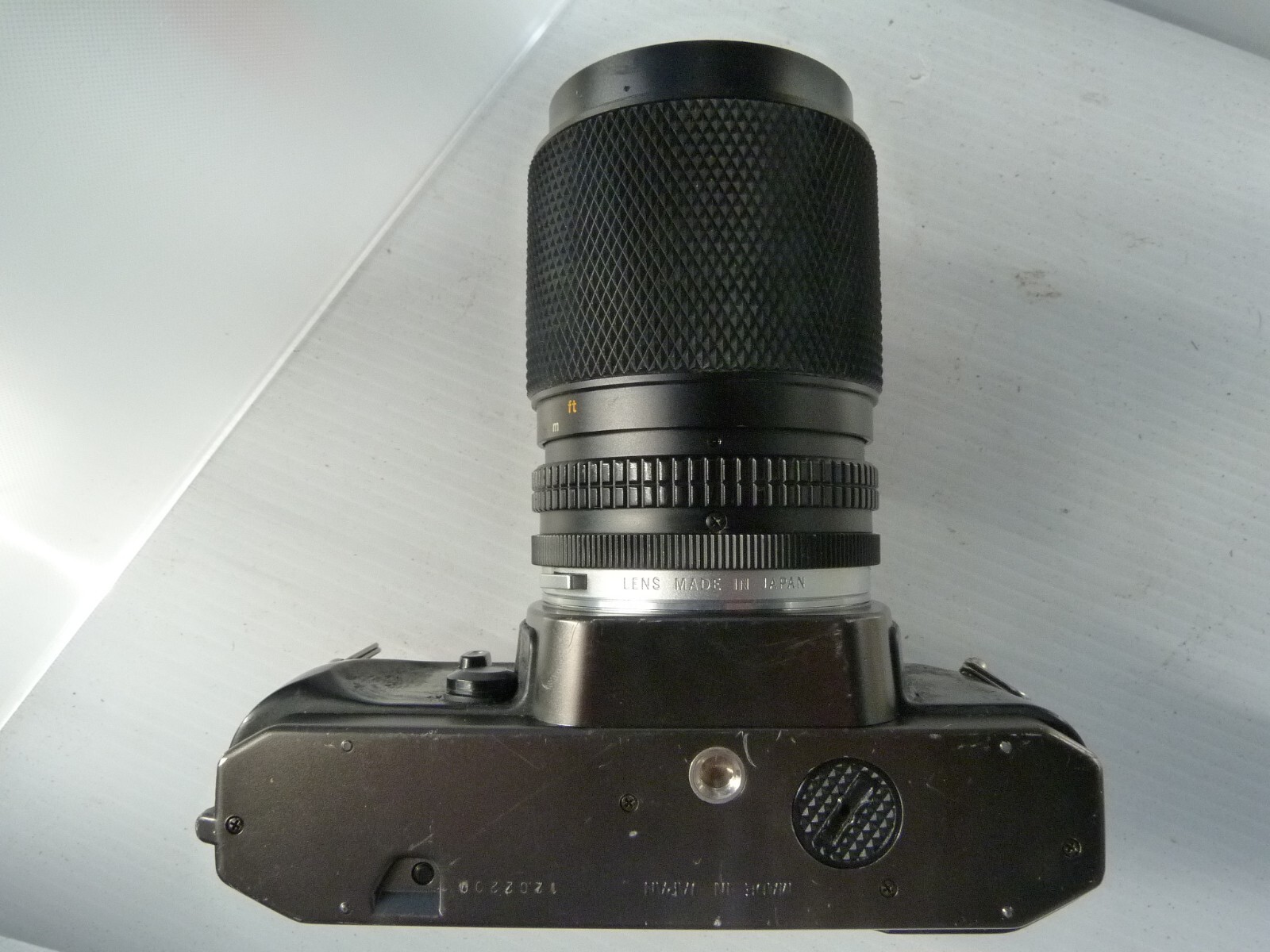 OLYMPUS OM2000 spot metering 35mm SLR Film Camera with 35-105/3.5-4.5 lens. READ