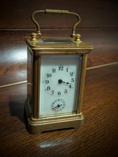 Old antique small 3.5 inch tall French carriage clock with alarm chime bell. 