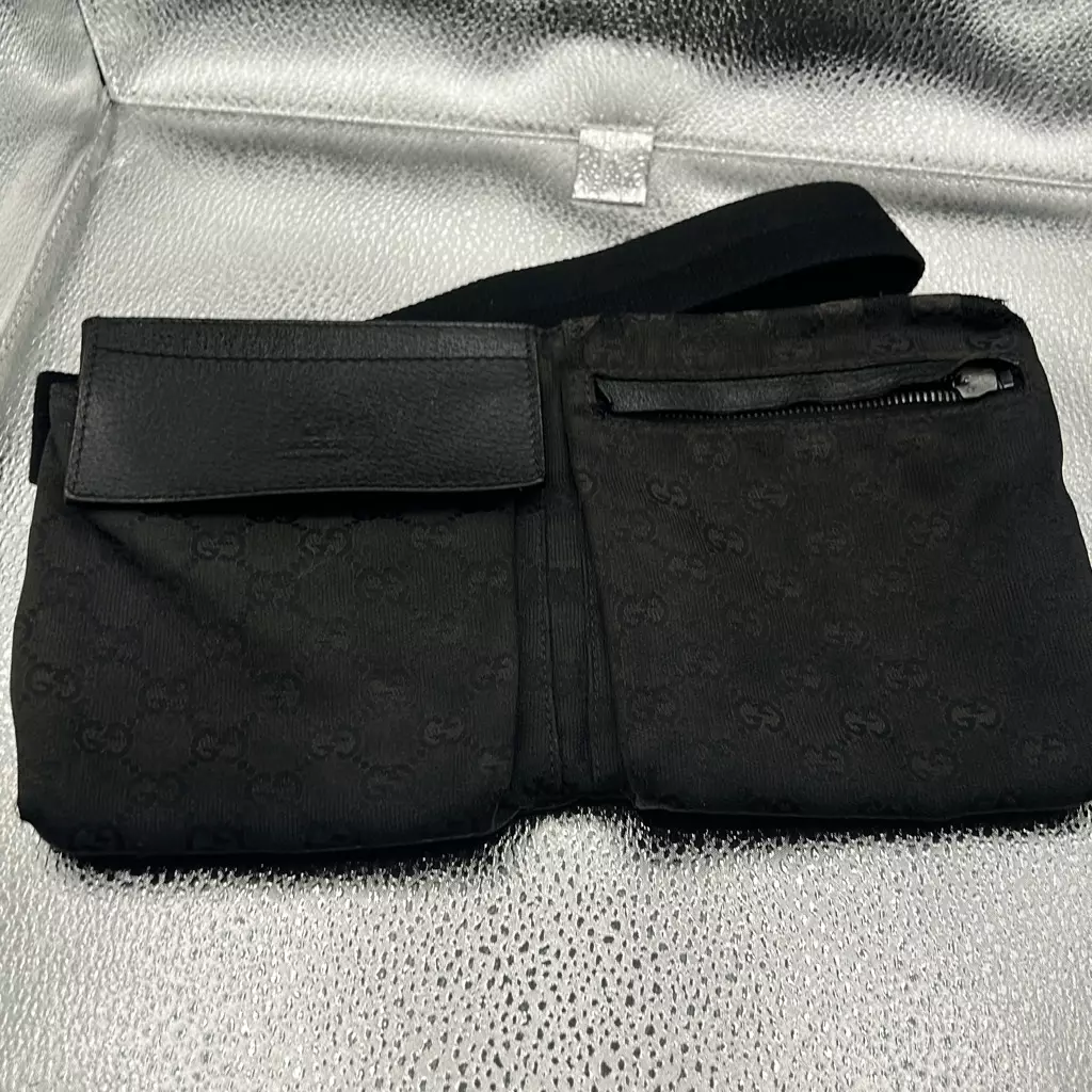 Sac ceinture Gucci GG logo imprimé noir signature monogramme sac banane voyage