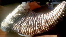 Vintage Large wheat woven mouthed footed cornucopia for a table display.