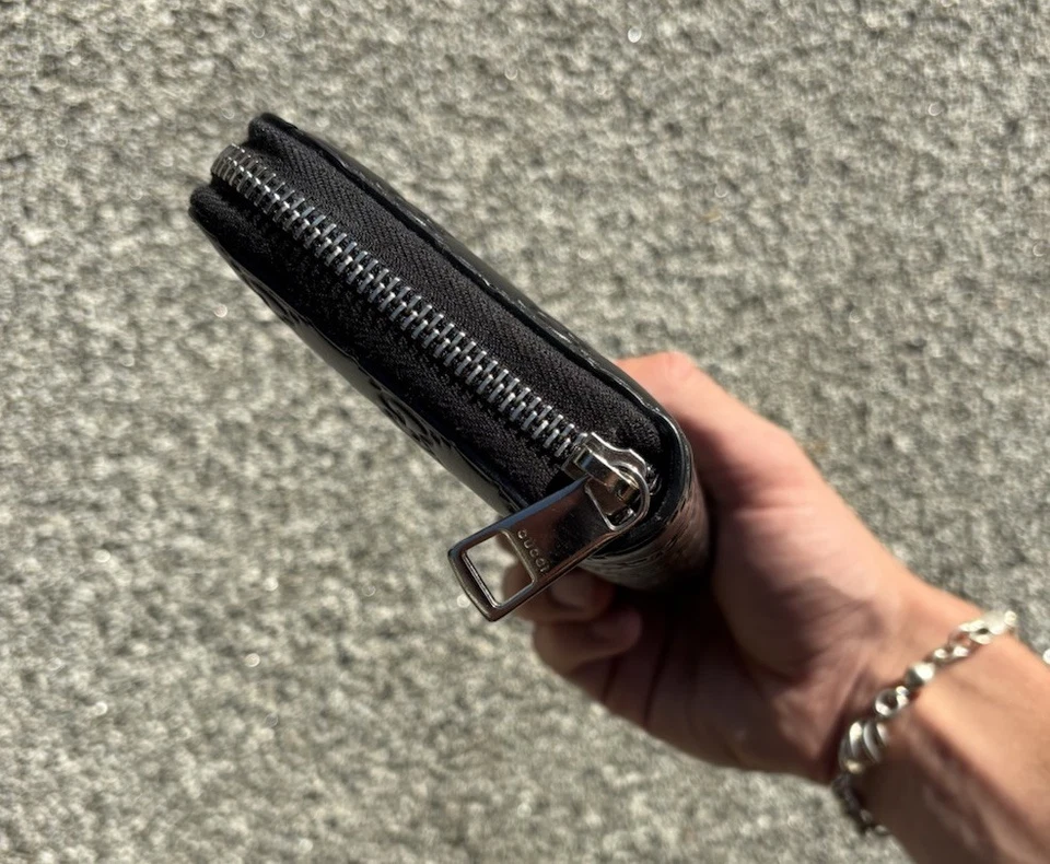 Подлинный бумажник Gucci GG Guccissima из черной кожи на молнии вокруг - Изображение 2 из 4