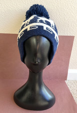 Obermeyer Navy Knit Cap With White Reindeer And Navy Pom-Pom