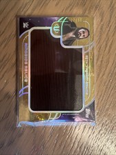 2025 WWE Universe Gold Ringside Relics Seth Rollins /50