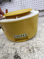 Vintage Rubbermaid lazy Susan, rotating containers.