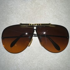 Vintage Aviator frame w/"sports" logo Amber colored lens sunglasses purple case