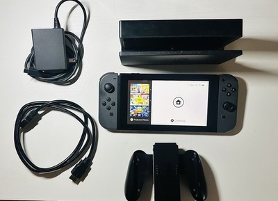 Nintendo Switch + Joy-Cons + dock + charger + HDMI + grip