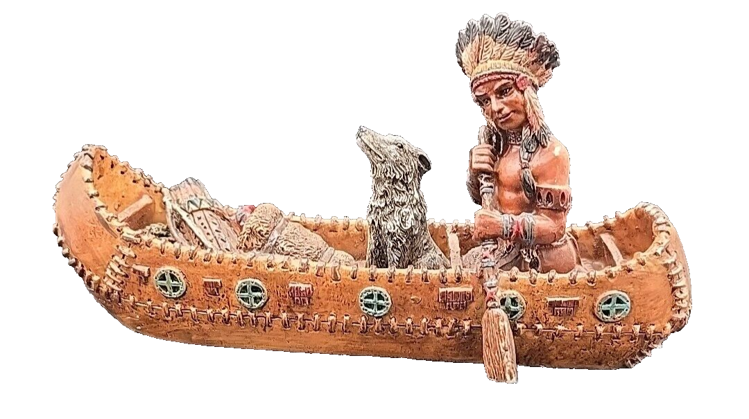 Native American Indian Statue In A Sculpted Canoe With Dog Mad Of Resin