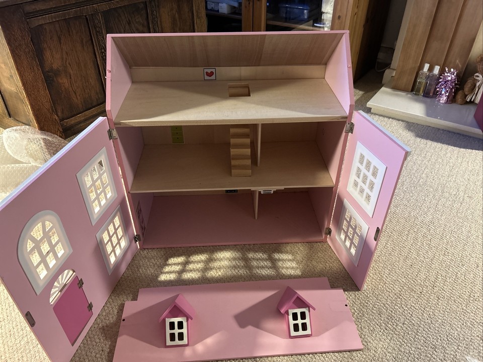 Large wooden Pink dolls house with furniture And People Would Make