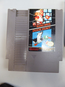 Lotto 4 giochi Nintendo NES Tetris Mario Duck Hunt Wizards & Warriors WWF Steel Cage