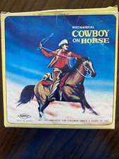 VINTAGE 1970's TIN WIND UP COWBOY ON BUCKING HORSE MTU Korea