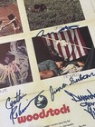 JSA COA WOODSTOCK 10X SIGNED 1969 11X17 Poster Stills Fito Robinson Lee — photo 5