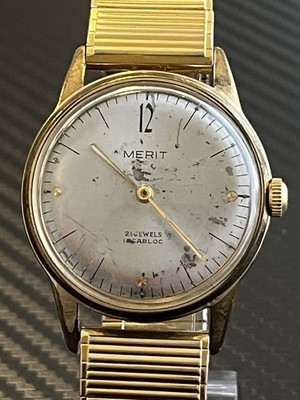 MERIT Herren Armbanduhr Handaufzug (34mm) läuft