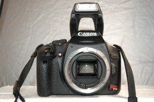 Canon EOS Rebel T1i DSLR Camera Body  Battery Charger  16GB SD Card.
