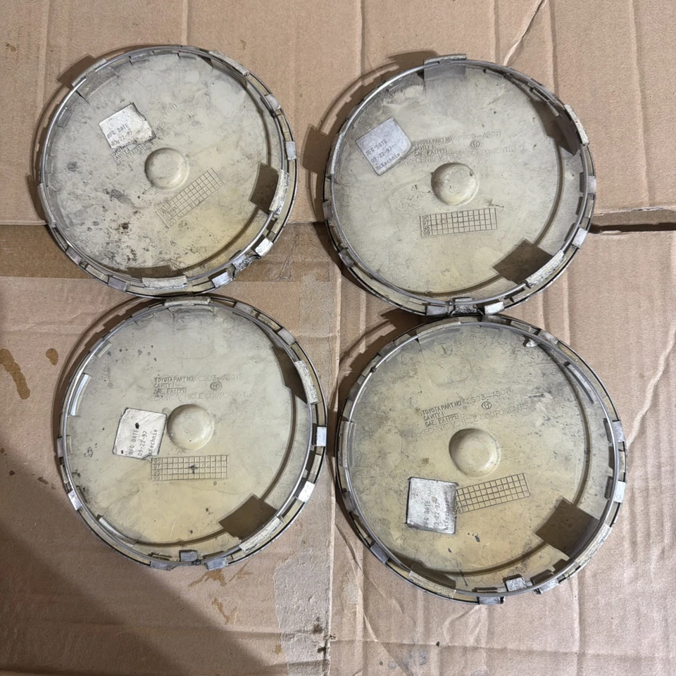 Juego de 4 tapas centrales de llantas de aleación Chevy Prism 1993-2002 usadas #42603-AB011 Foto 2 de 2