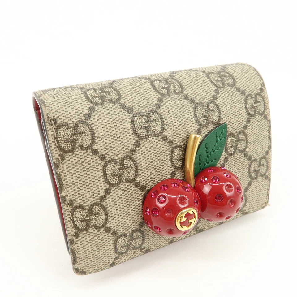 Cartera Compacta GUCCI Interlocking G Cherry GG Supreme Beige 476050 Auténtica Usada Envío Gratis Foto 4 de 4