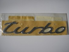 Porsche "Turbo" Silver Script Badge.