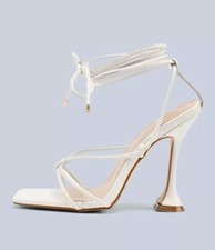 Open toed white lace up heels