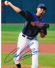 CARLOS CARRASCO  CLEVELAND INDIANS   ACTION SIGNED 8x10