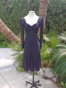 black cocktail dress with sheer sleeves