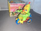 VINTAGE MARX MUNCHIE MELON WIND UP TIN AND PLASTIC TOY TRICYCLE