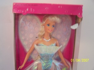barbie con alas y burbujas