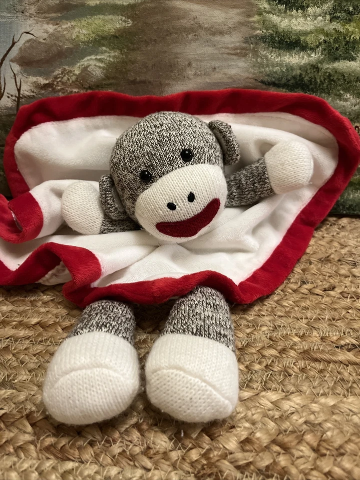 Baby Starters Calcetín Mono Lovey Manta de Seguridad 12” Sonajero Satinado Blanco Rojo Foto 2 de 4