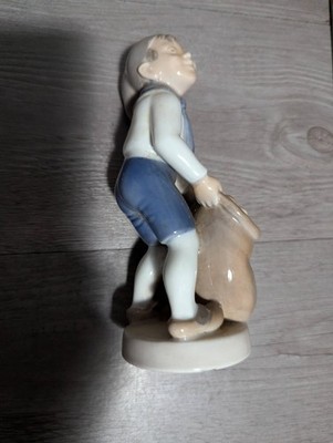 Royal Copenhagen #4534 December Boy w/Sack Hans Henrik Hansen