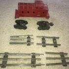 LIONEL #2257 RED CABOOSE,  Trucks, And Tracks — photo 1