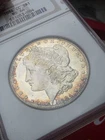 1884 CC CARSON CITY SILVER MORGAN DOLLAR NGC MS64 RAINBOW TONED