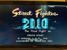 Nintendo NES Street Fighter 2010 NICE WORKS w instructions Box Styrofoam Inserts