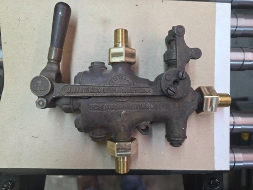 Schutte and Korting #1 (3/8" NPT) injector with new nuts and tailpipes.