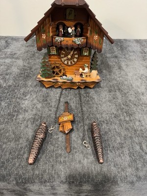Cuckoo Clock with Dancers, Water Wheel, Cuckoo Bird And Drinker All Animated.