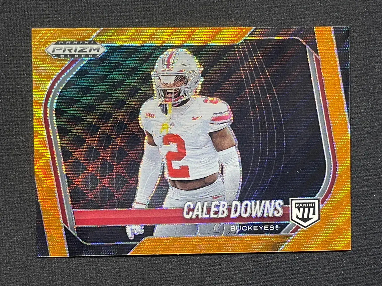 2025 Panini Prizm Black Orange Wave Prizm NIL #190 Caleb Downs /60 (RC) YT92