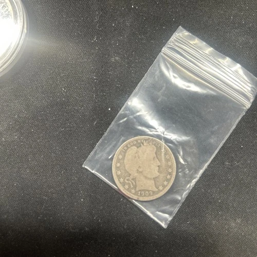 1909 Barber Quarter.