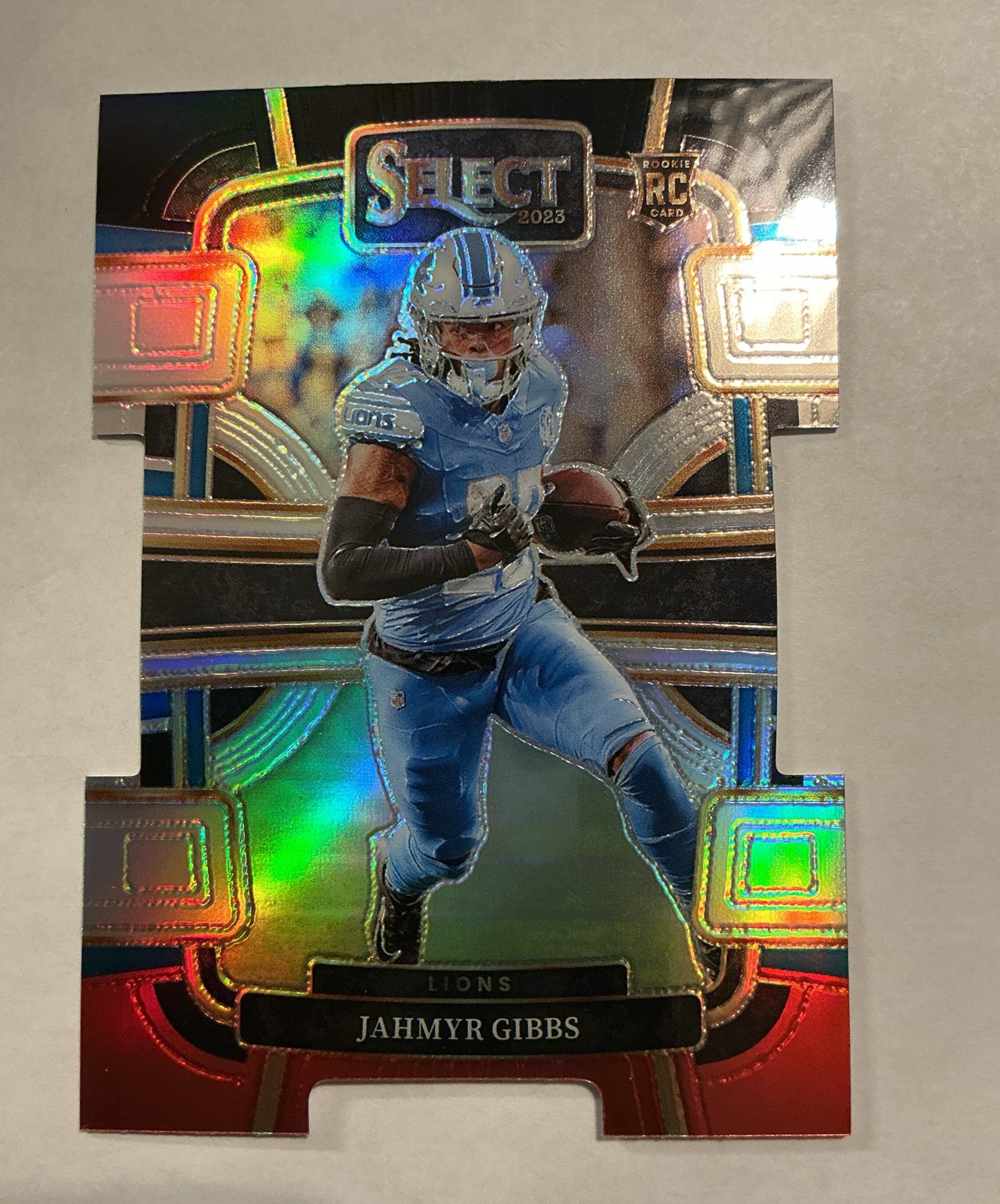 2023 Panini Select - Concourse Jahmyr Gibbs #34 Red & Blue Prizm Die-Cut (RC)