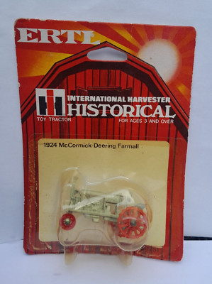 Vintage ERTL DRUCKGUSS 1924 McCORMICK DEERING FARMALL 1/64. TRAKTOR AUF NICHT NEUWERTIGSKARTE
