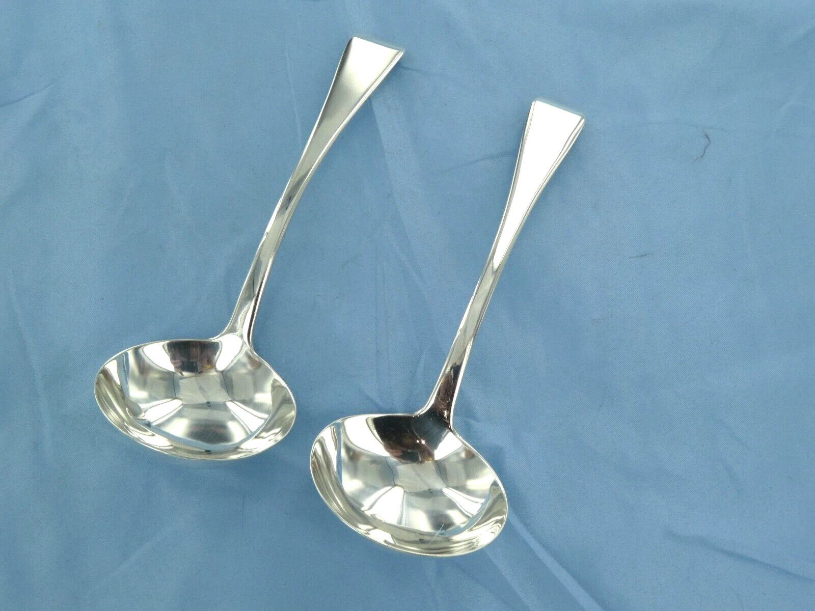 AN ANTIQUE STERLING SILVER PAIR OF OLD ENGLISH SAUCE LADLES.LONDON 1846.
Opens in a new window or ta