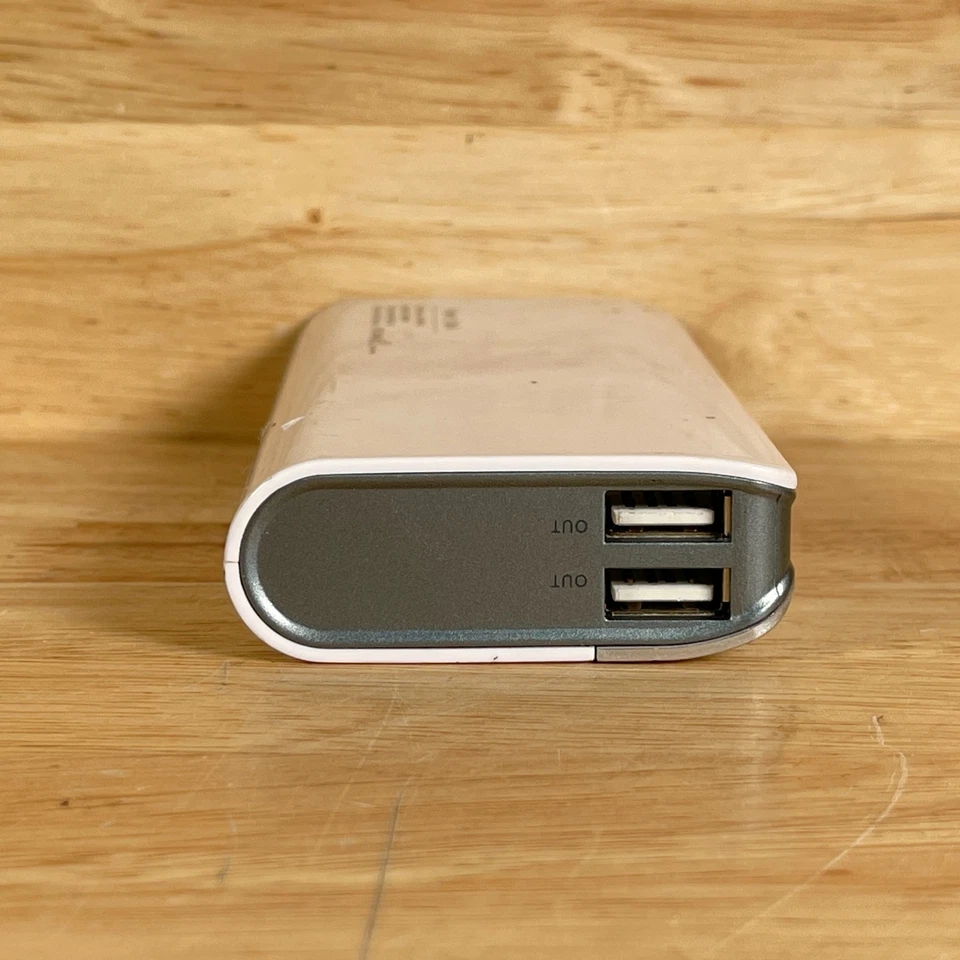 Banco de alimentación portátil Lumsing LUM-008-02 blanco y plateado 13000 mAh puertos USB dobles Foto 2 de 3