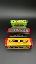 Wrigley's Juicy Fruit, Double Mint, And Spearmint Chewing Gum With Tins