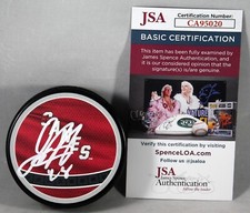 JORDAN MARTINOOK SIGNED CAROLINA HURRICANES REVERSE RETRO PUCK AUTO +JSA COA